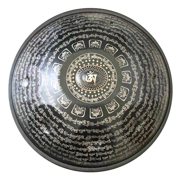 Engraved Tibetan calligraphy on a Handpan, metallic percussion instrument for healing and sound therapy
