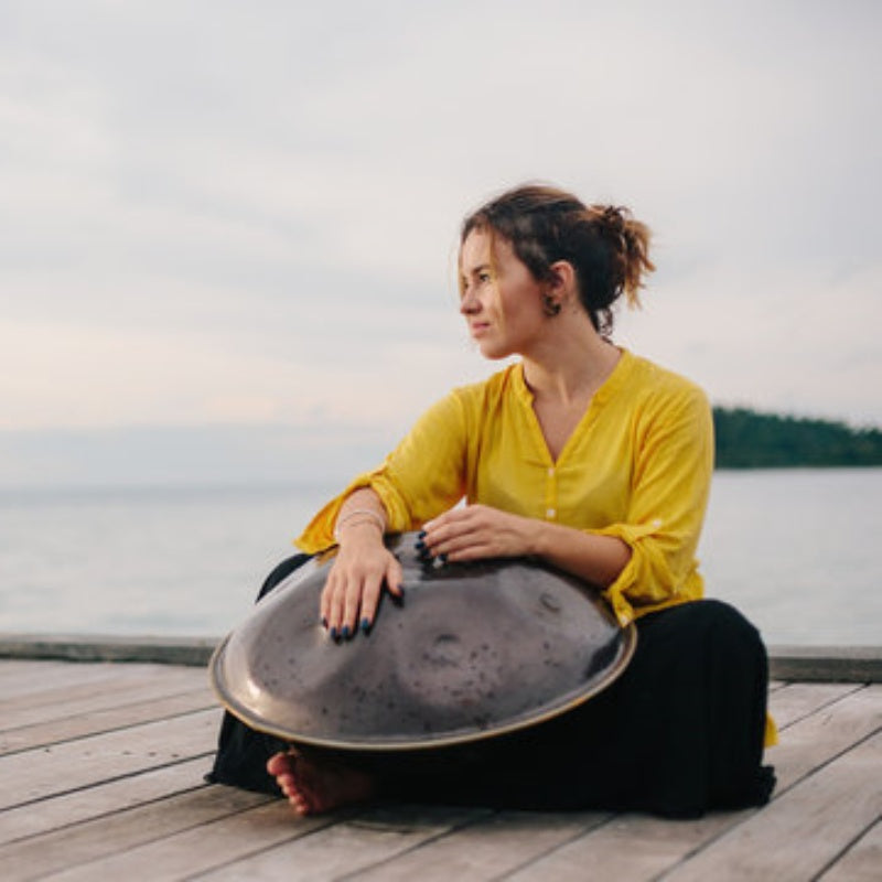 Female artists playing handpan