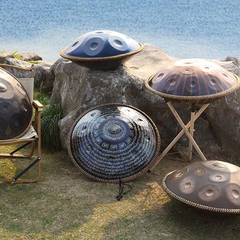 A variety of fine handpan displayed in natural light