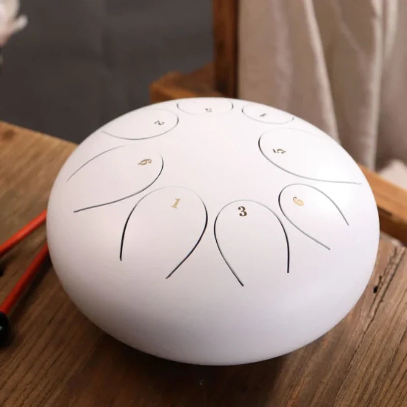 Elegant white steel tongue drum with resonant tongues