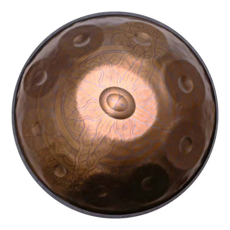 A beautifully carved golden handpan featuring an intricate pyramid pattern.