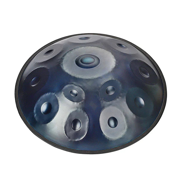 The side profile of a blue handpan, emphasizing its intricate design and skilled artistry.