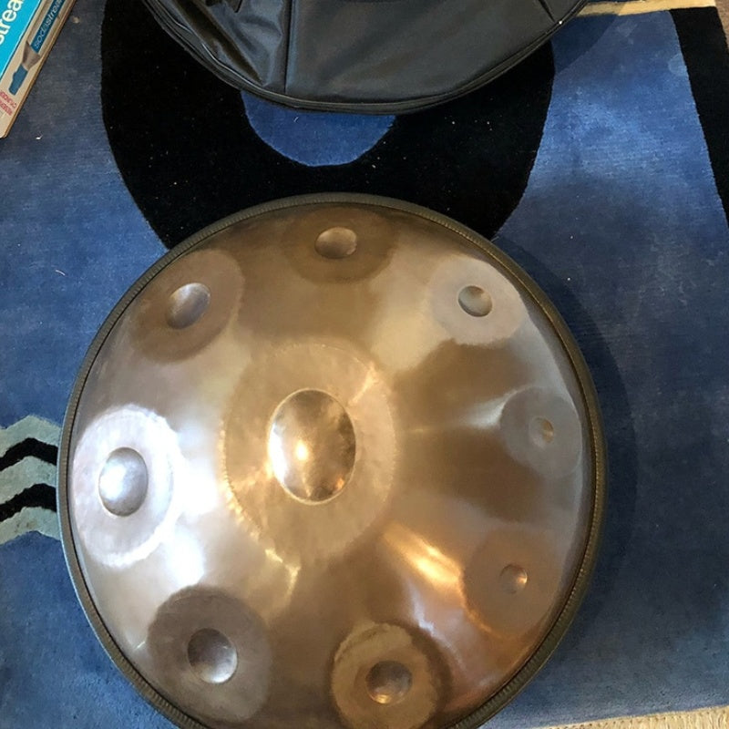 Unboxing a stunning gold handpan drum — discover its craftsmanship, design details, and mesmerizing sound in this detailed video showcase.