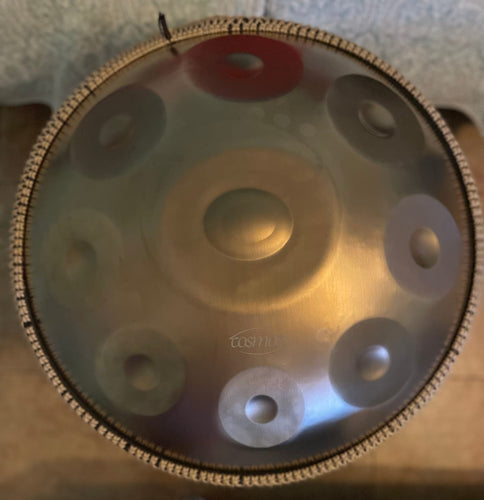 Close-up of a golden Cosmos Handpan showcasing its elegant finish and craftsmanship