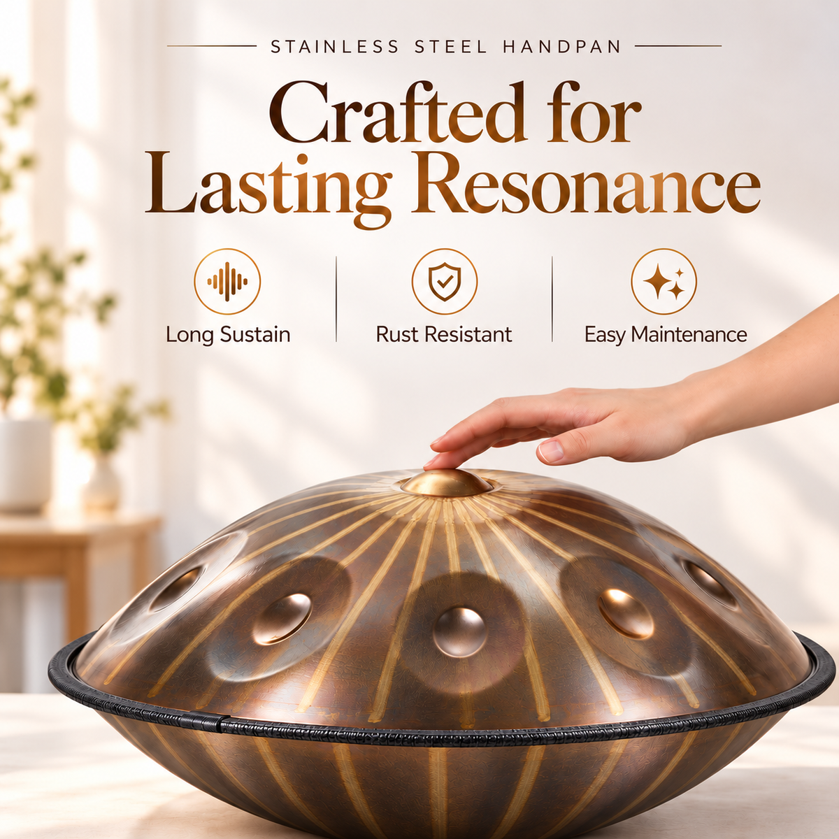 Close-up of a shimmering Gold handpan drum with sun totem designs
