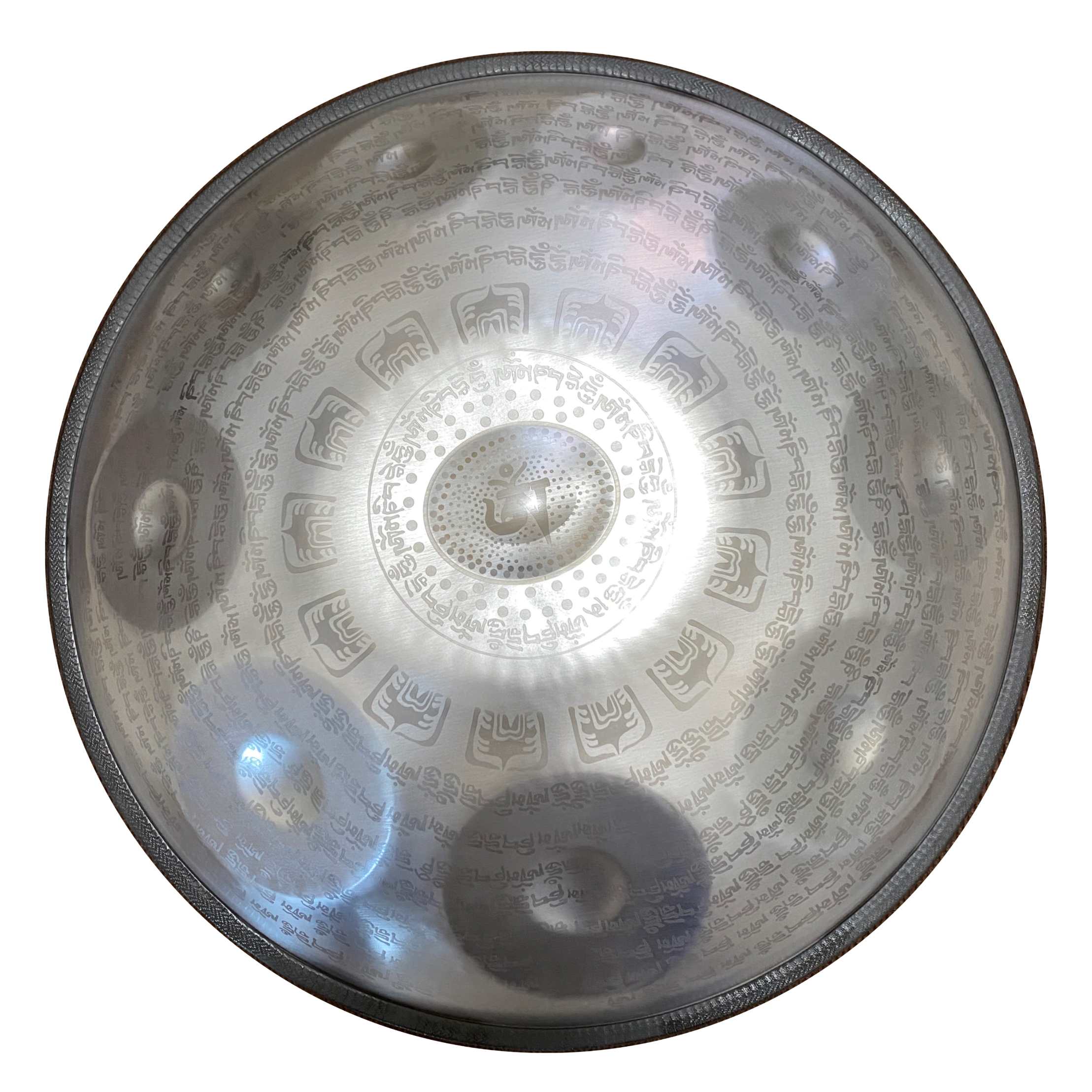 Handpan instrument with traditional Tibetan script engraving
