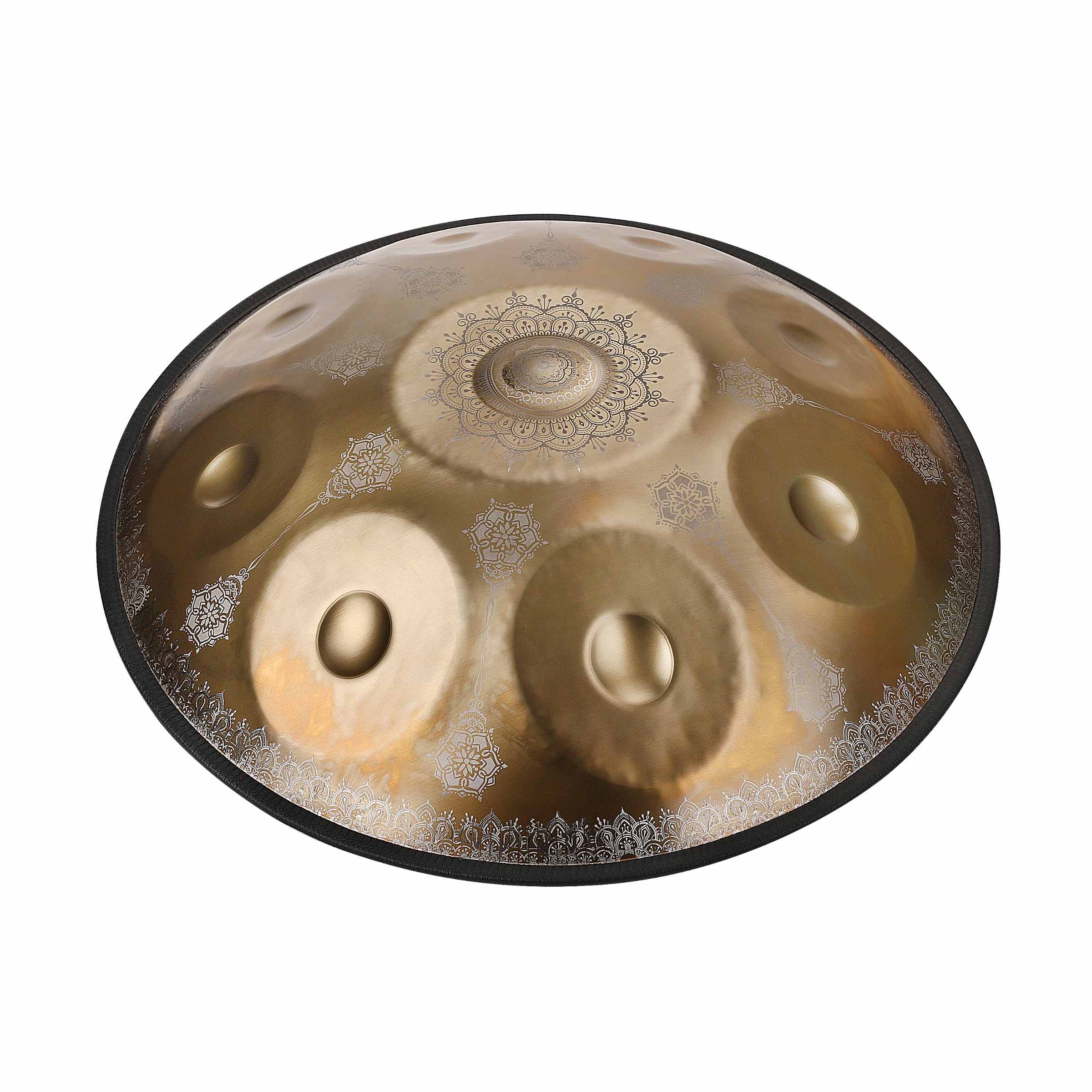 Close-up of a shimmering Gold handpan drum with floral motifs