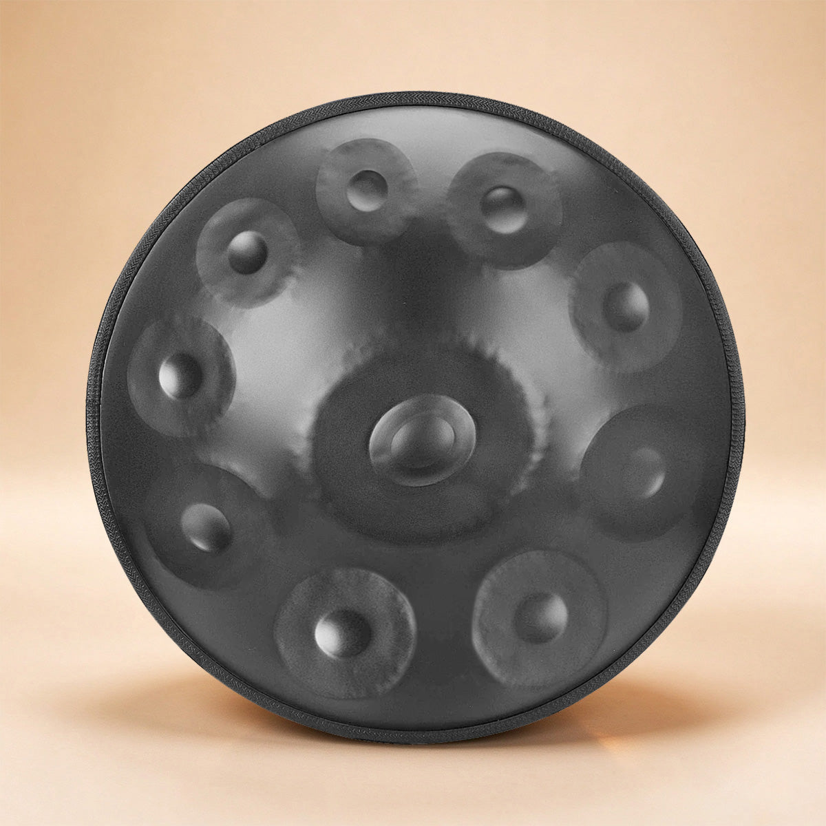 Black handpan drum with a matte finish