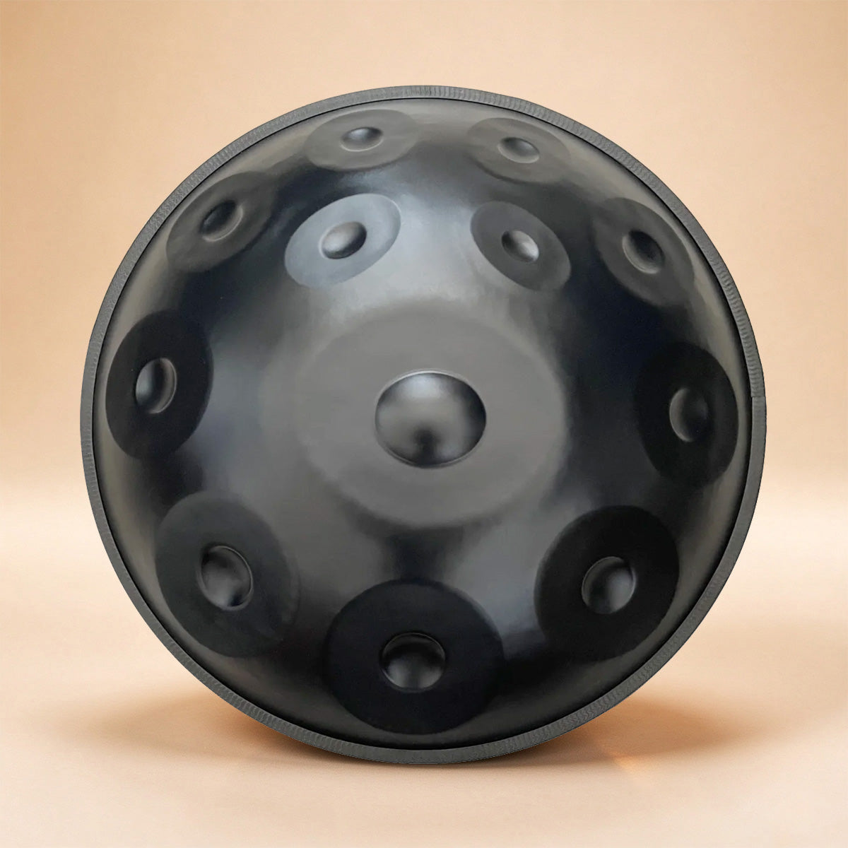 Black handpan showcasing intricate craftsmanship
