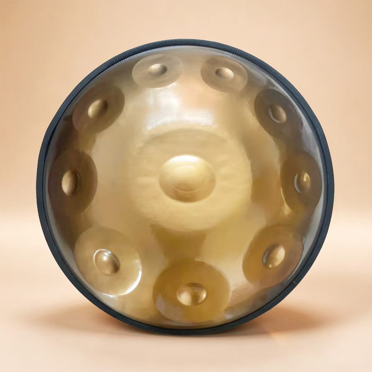 Handpan in radiant Golden hue under soft lighting