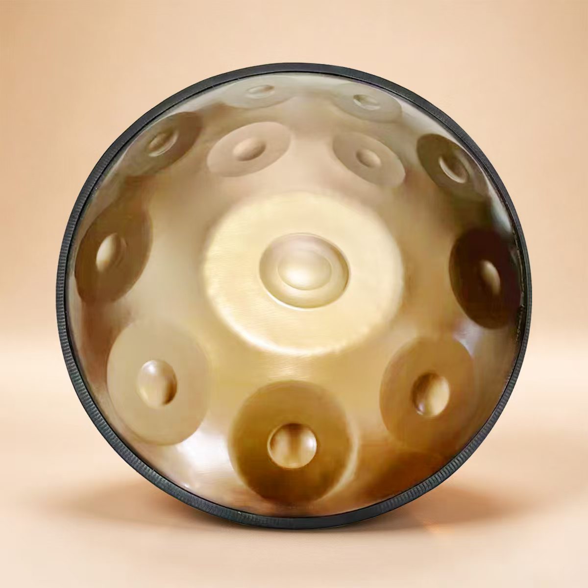 Handpan with radiant Golden tones and metallic accents